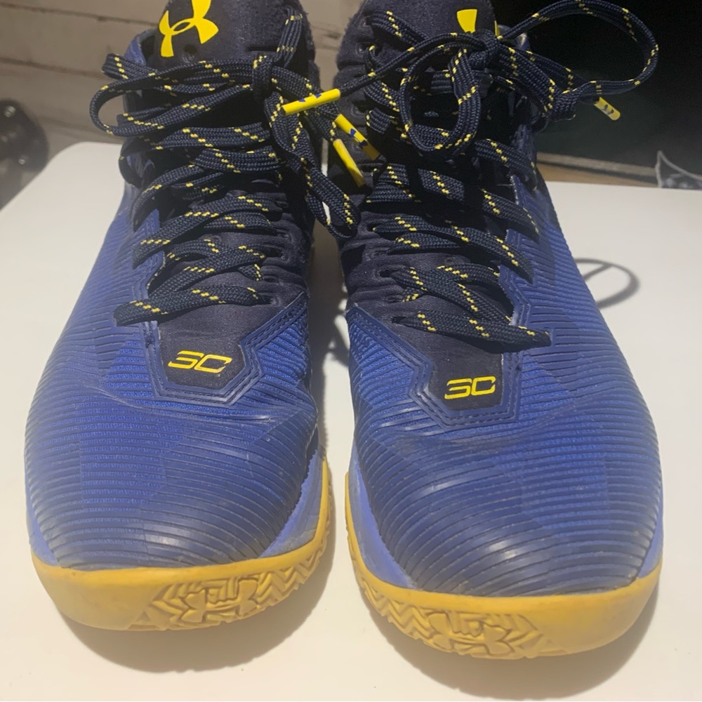 Blue and yellow Curry basketball shoes